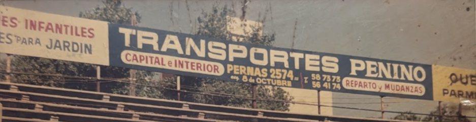 Cartel de Transportes Penino en estadio Franzini — Montevideo